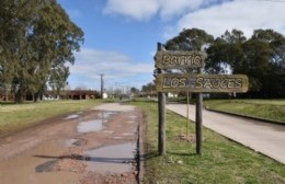 Repavimentarán la calle de egreso del barrio Los Sauces